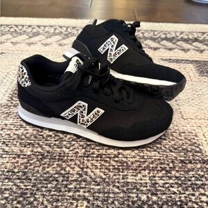 New Balance 515 Black Sneakers with Leopard accent.